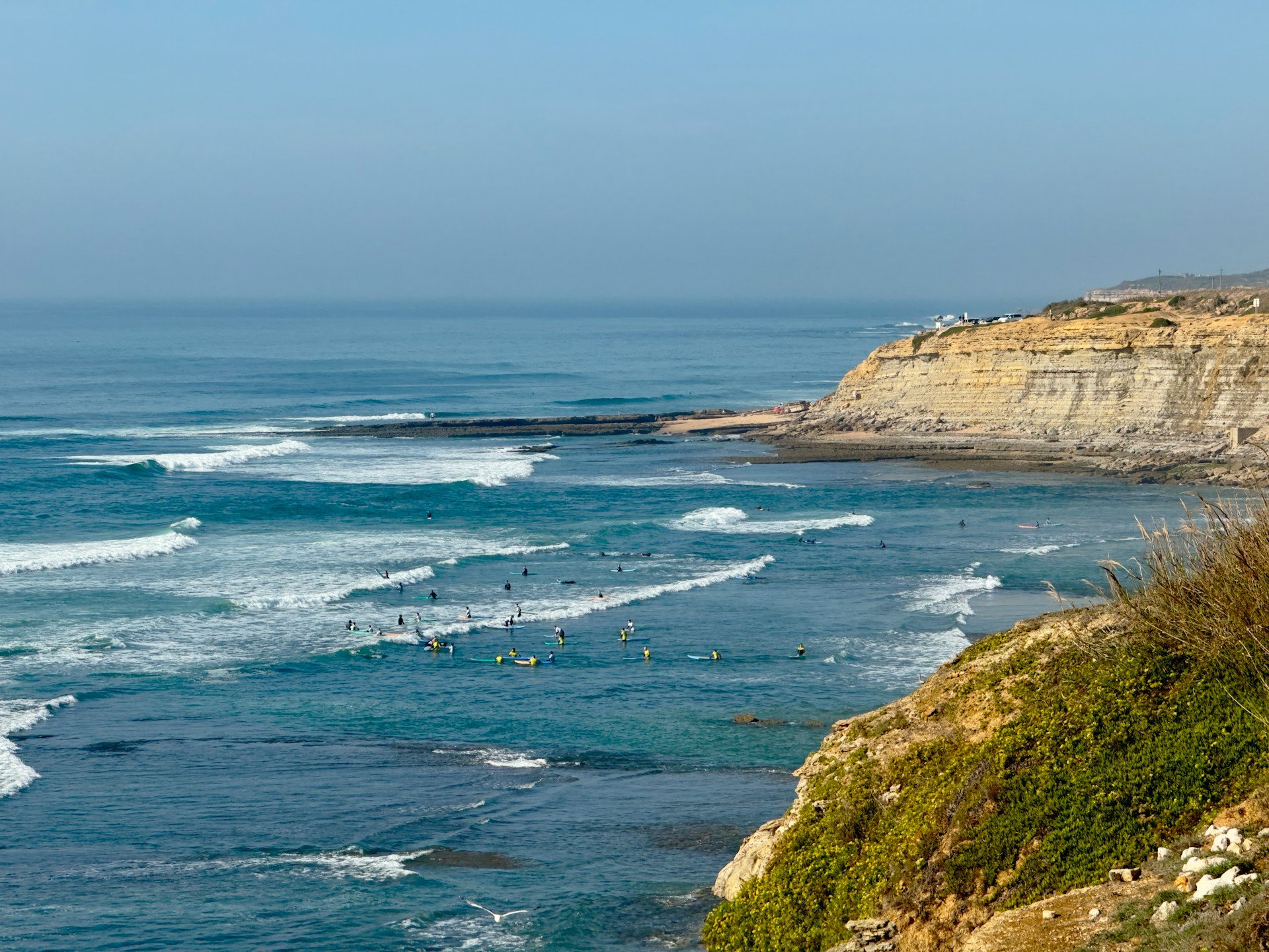 Beginner surfing in Portugal