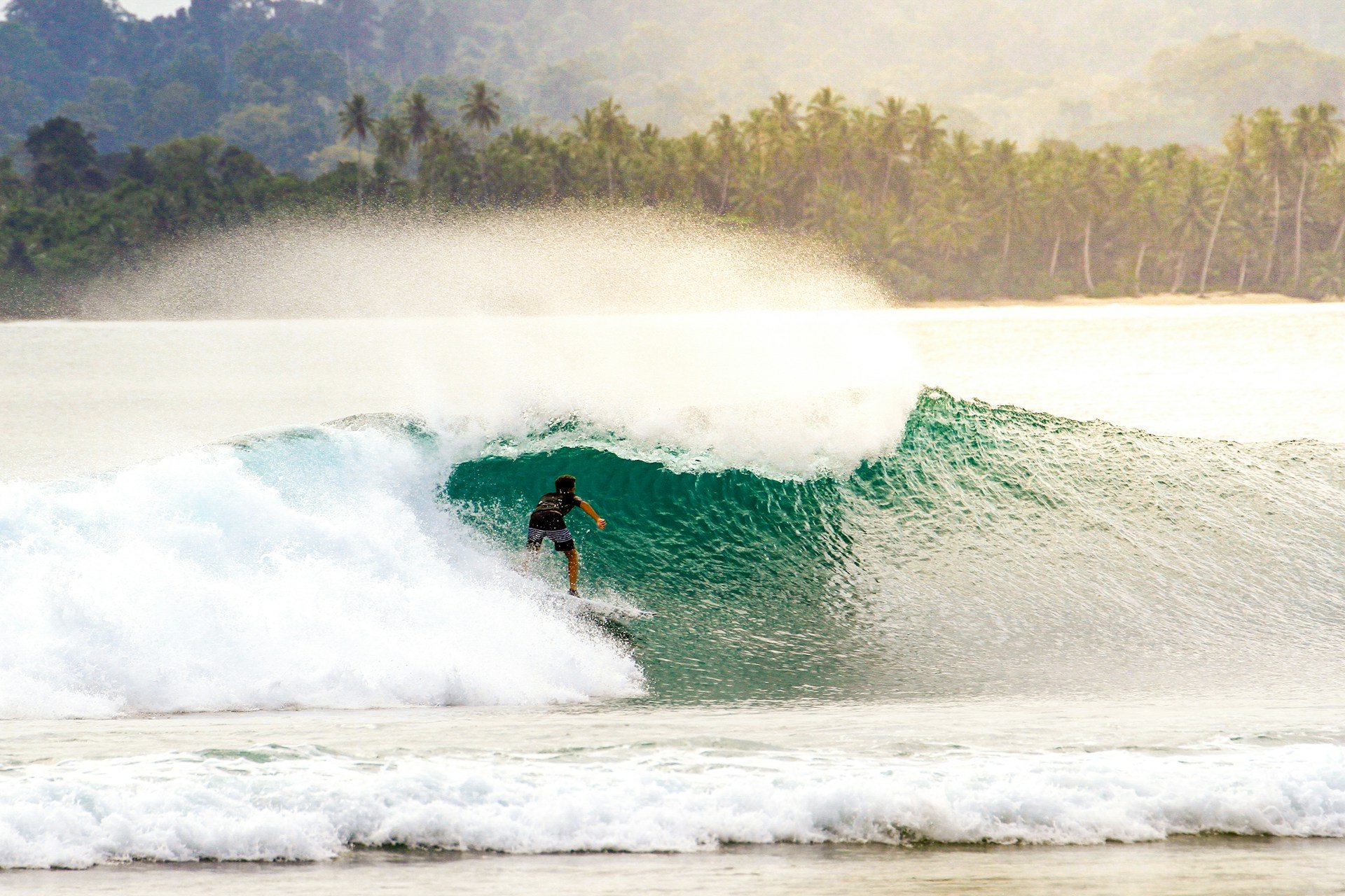 Perfect barrel at one of Mentawais' world-class reef breaks. Photo: James Donaldson